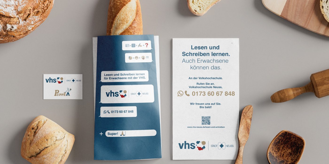 Brottüte für die VHS Neuss und die Bäckereien Schneider und Puppe zum Thema Alphabetisierung